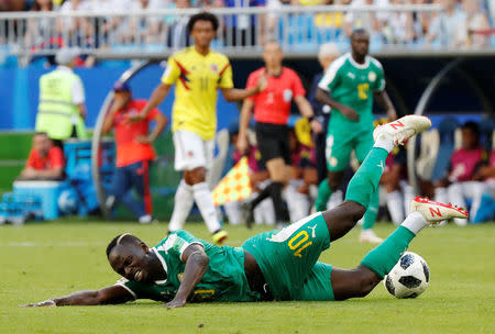 Soccer Football - World Cup - Group H - Senegal vs Colombia - Samara Arena, Samara, Russia - June 28, 2018 Senegal's Sadio Mane reacts during the match REUTERS/Carlos Garcia Rawlins