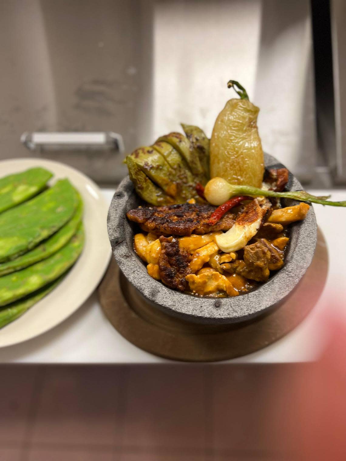 Molcajete, grilled Mexican cactus with grilled chicken, steak, chorizo (sausage), shrimp, fresh cheese and topped with the restaurant’s “special sauce.”