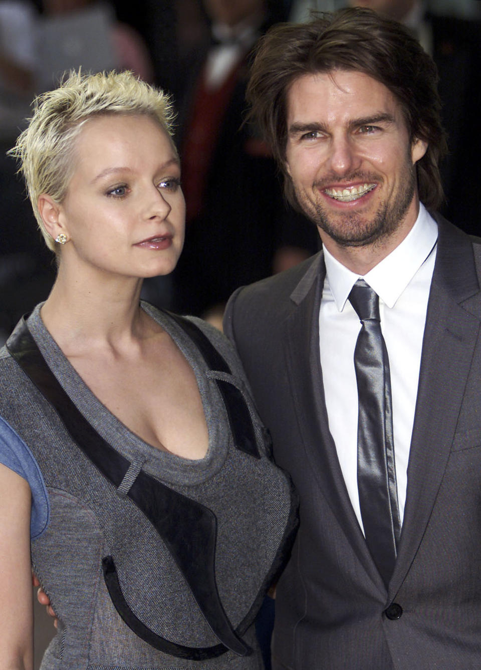 U.S. actor Tom Cruise and Britain's Samantha Morton arrive for the film premier of 'Minority Report' at The Odeon in Leicestor Square, London June 26, 2002. Directed by Steven Spielberg, the film offers a bleak, futuristic vision of America in 2054 with Cruise playing a Washington D.C police chief forced to hide his name after it appears on a list naming future murderers. REUTERS/Michael Crabtree MC/NMB