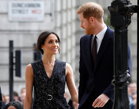 Britain's Prince Harry and his fiancee Meghan Markle arrive at a service at St Martin-in-The Fields to mark 25 years since Stephen Lawrence was killed in a racially motivated attack, in London, Britain, April 23, 2018. REUTERS/Peter Nicholls