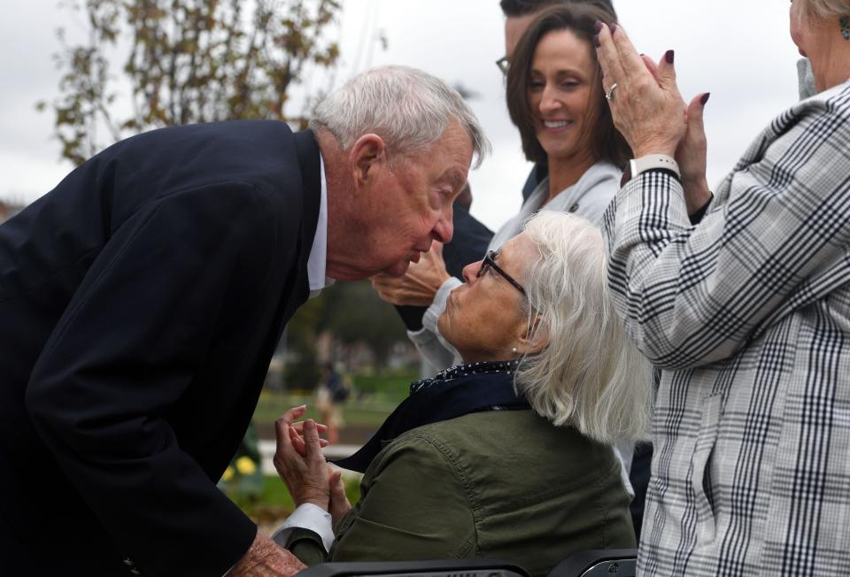 Ralph H. Wagoner kisses his wife after cutting a ribbon on the new dormitory building named after him on Friday, September 23, 2022, at Augustana University in Sioux Falls.