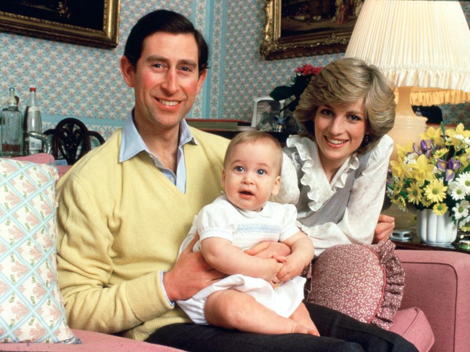 Prince Charles, Princess Diana, and Prince William, at home in Kensington Palace in 1983.