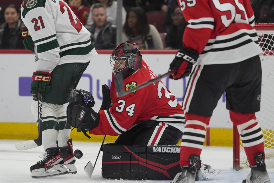 Chicago Blackhawks goaltender Petr Mrazek makes a save during the first period of an NHL hockey game against the Minnesota Wild, Wednesday, Feb. 7, 2024, in Chicago. (AP Photo/Erin Hooley)