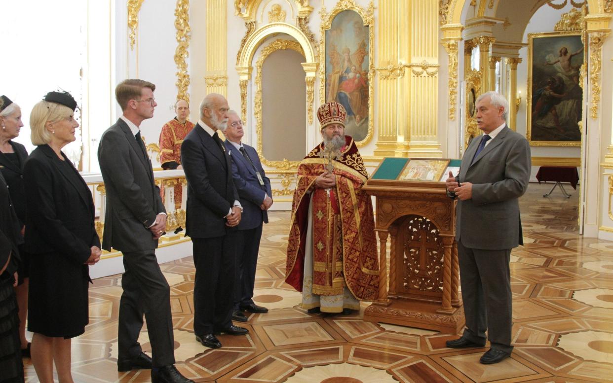 Prince Michael of Kent and Princess Olga attend the Divine Liturgy dedicated to the 100th anniversary of the death of the last Tsar