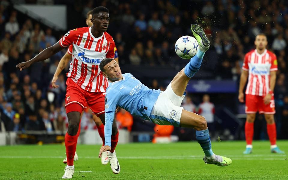 Crvena Zvezda's Nasser Djiga in action with Manchester City's Phil Foden