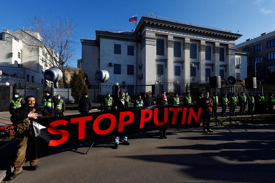 Ukrainians protest outside the Russian Embassy in Kyiv, Ukraine