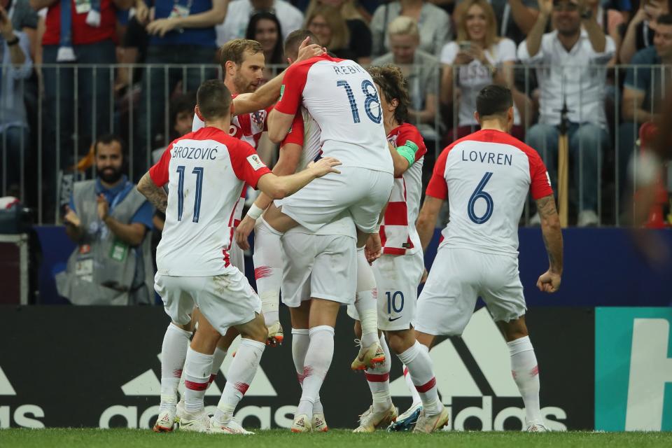 <p>Ivan Perisic of Croatia celebrates after scoring a goal to make it 1-1. (Photo by Matthew Ashton – AMA/Getty Images) </p>