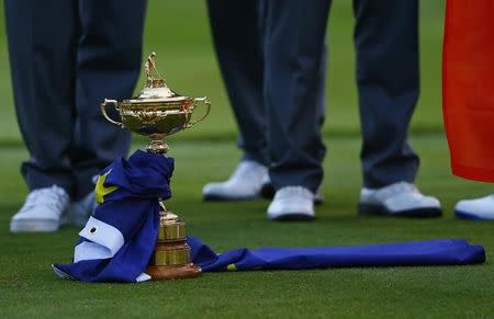 The Ryder Cup sits on the grass at the driving range following the closing ceremony of the 40th Ryder Cup at Gleneagles in Scotland September 28, 2014. REUTERS/Eddie Keogh/Files