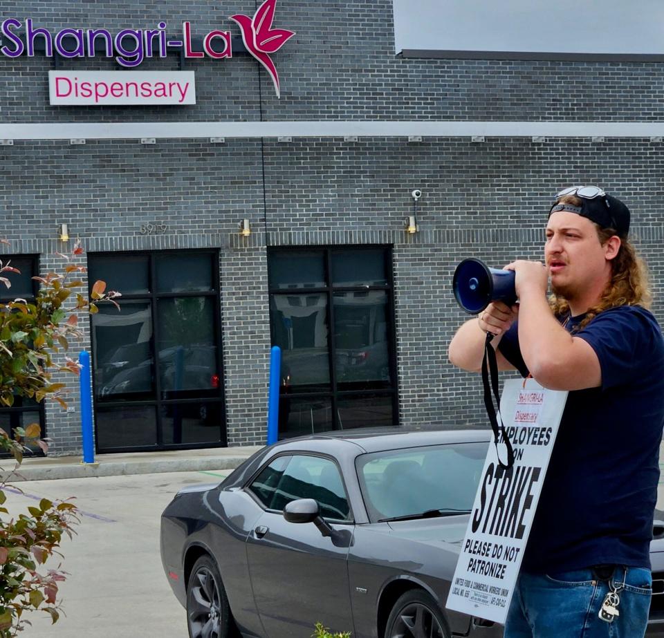 Sean Shannon, an organizer with United Food and Commercial Workers Local 655, speaks during a protest on May 16 against unfair labor practices at Shangri-La South dispensary in Columbia.