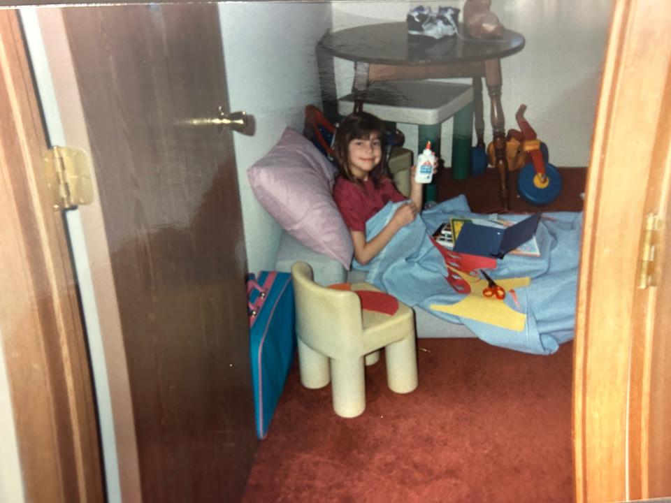 Laura Jones is pictured working on crafts while in bed as a child. Throughout Jones' life she loved working on crafts, her mother Donella Corlett said.