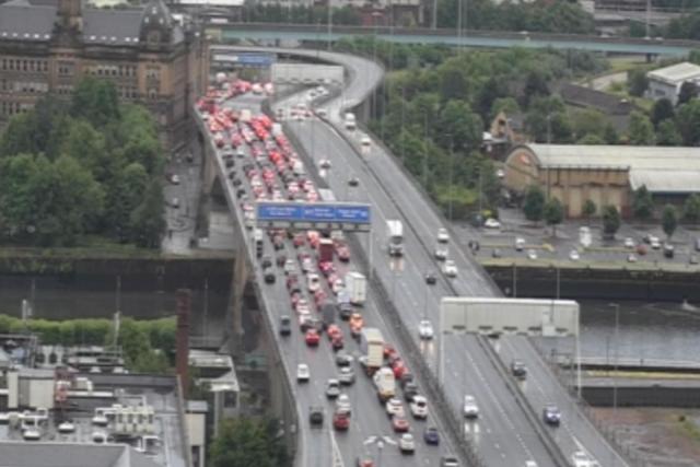 Travel chaos as motorway carriageway closed and trains diverted