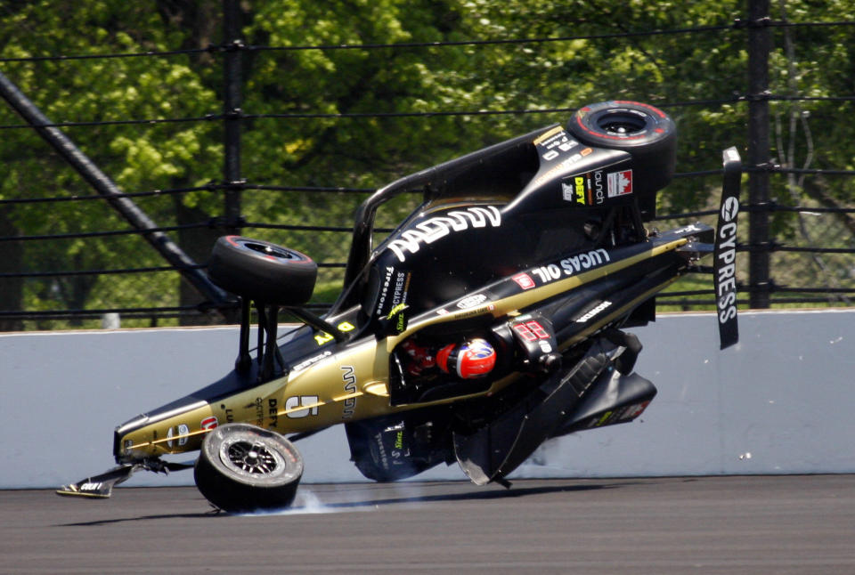 James Hinchcliffe, of Canada, goes airborne after hitting the wall in the second turn during qualifications for the Indianapolis 500 IndyCar auto race at Indianapolis Motor Speedway, Saturday, May 18, 2019, in Indianapolis. (AP Photo/Mike Fair)