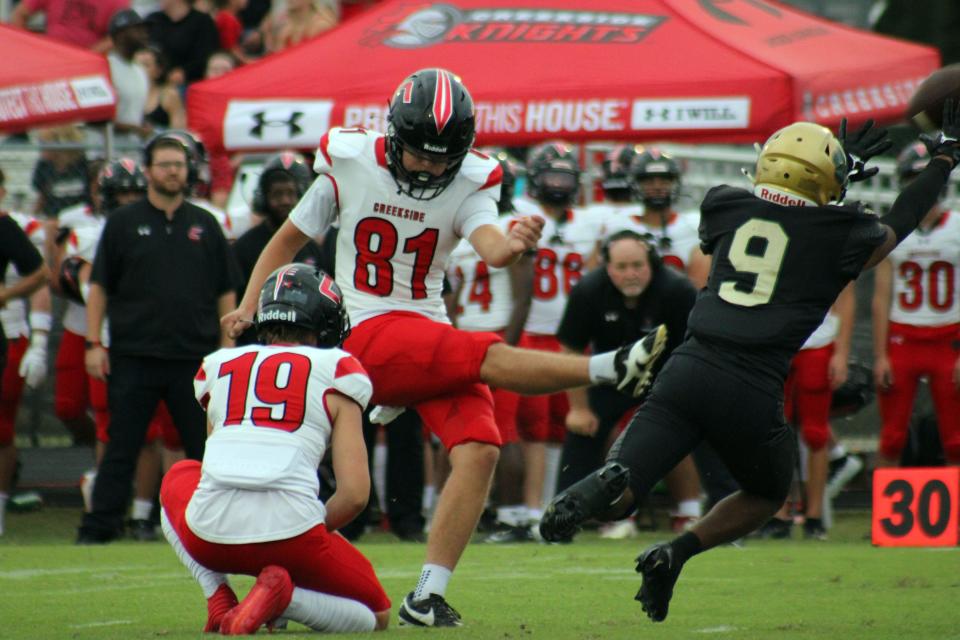 Creekside's Cooper Maurer (81) kicks a 37-yard field goal against Nease.