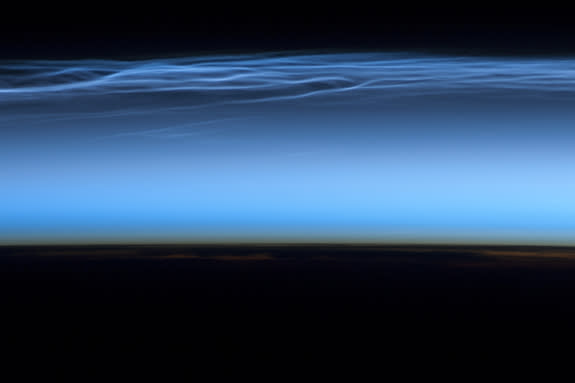 Astronauts on the International Space Station took this picture of noctilucent clouds near the top of Earth's atmosphere on July 13, 2012.