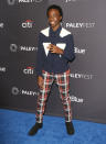 <p>Caleb McLaughlin attended the 2018 PaleyFest in tartan trousers and a seriously covetable shirt. <em>[Photo: Getty]</em> </p>