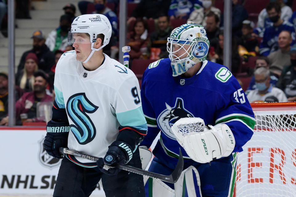 VANCOUVER, BC - OCTOBER 05: Seattle Kraken center Ryan Donato (9) stands in front of Vancouver Canucks goaltender Thatcher Demko (35) during their preseason NHL game on October 5, 2021 at Rogers Arena in Vancouver, British Columbia, Canada. (Photo by Derek Cain/Icon Sportswire via Getty Images)