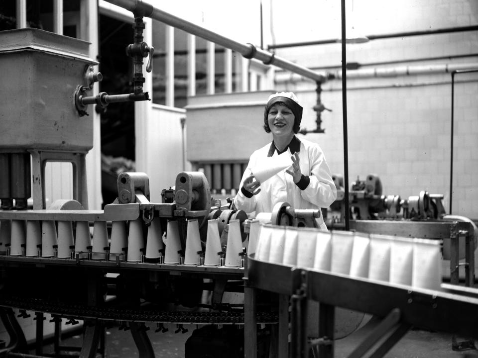 A woman at a milk bottling plant in the 1920s.