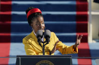 American poet Amanda Gorman reads a poem during the 59th Presidential Inauguration at the U.S. Capitol in Washington, Wednesday, Jan. 20, 2021. (AP Photo/Patrick Semansky, Pool)