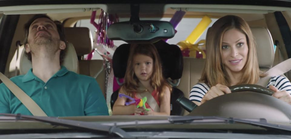 In a scene from 'I'm Sorry' Andrea drives her husband and daughter home from a party