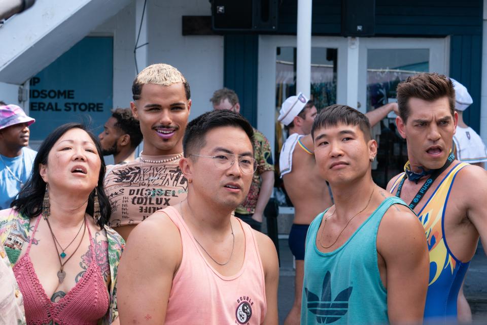 "Fire Island": The romantic comedy inspired by Jane Austen’s "Pride and Prejudice" centers on two best friends (Bowen Yang and Joel Kim Booster, center, with Margaret Cho, Tomás Matos and Matt Rogers) aiming to have a legendary summer full of cheap rosé and eclectic friends.