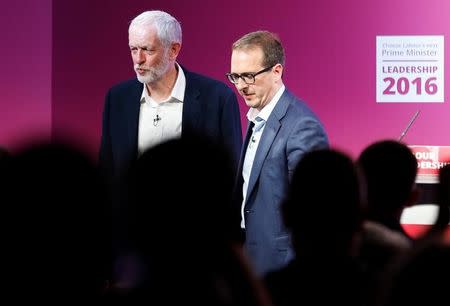 Labour Party leader Jeremy Corbyn (L) and challenger Owen Smith leave the stage after a hustings event of the Labour leadership campaign in Birmingham, Britain, August 18, 2016. REUTERS/Darren Staples