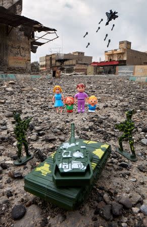 One of the pictures of the photo series titled WAR-TOYS project, in Mosul, Iraq, obtained by Reuters on July 9, 2018. REUTERS/Brian McCarty Handout via Reuters