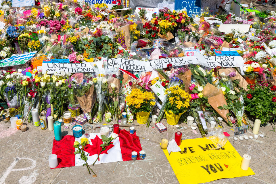 TORONTO, ONTARIO, CANADA - 2018/04/30: Toronto Van Attack a week later:  wide angle and aerial view of the memorial in Mel Lastman square. There is a Canadian flag at the front. (Photo by Roberto Machado Noa/LightRocket via Getty Images)