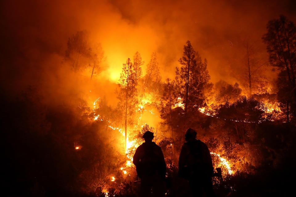 Firefighters battle the Mendocino Complex fire in Northern California. (Photo: Justin Sullivan via Getty Images)