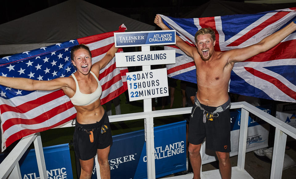 The pair celebrate on arrival