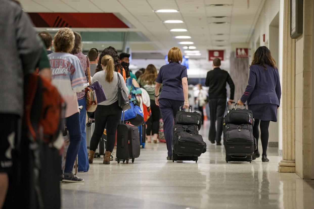 Airline passengers flying out of Tallahassee International Airport experience unusually long wait times in security line Thursday, April 14, 2022.