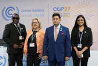 From left, Henry Kwabena Kokofu, of Ghana, Svenja Schulze, of Germany, A K Abdul Momen, of Bangladesh, and Sara Ahmed, of V20, pose for a photo ahead of a session at the COP27 U.N. Climate Summit, Monday, Nov. 14, 2022, in Sharm el-Sheikh, Egypt. (AP Photo/Peter Dejong)