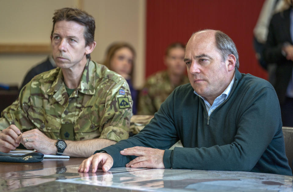 Britain's Defence Secretary Ben Wallace visits a training camp for new recruits of the Ukrainian army being trained by UK military specialists, near Manchester, England, Thursday, July 7, 2022. (Louis Wood/Pool Photo via AP)