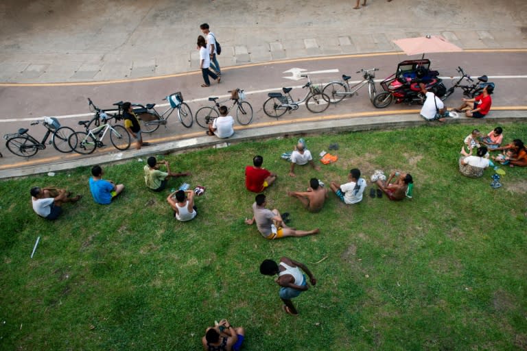 Yangon's parks offer some relief from scorching temperatures during daily electricity blackouts (Sai Aung MAIN)