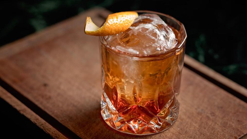 old fashioned cocktail with an orange twist