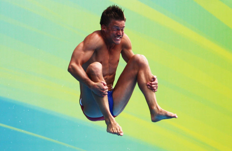 SHANGHAI, CHINA - JULY 16: Chris Colwill of the United States competes in the Men's 1m Springboard preliminary round during Day One of the 14th FINA World Championships at the Oriental Sports Center on July 16, 2011 in Shanghai, China. (Photo by Feng Li/Getty Images)