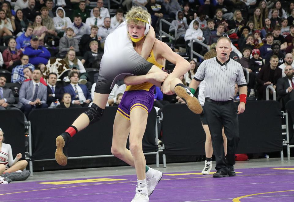 Watertown's Gage Lohr lifts Brandon Valley's Trevon Oehme during their Class A boys' 120-pound championship in the South Dakota State Individual Wrestling Tournament on Saturday, Feb. 24, 2024 in the Denny Sanford PREMIER Center at Sioux Falls. Lohr won 6-5.