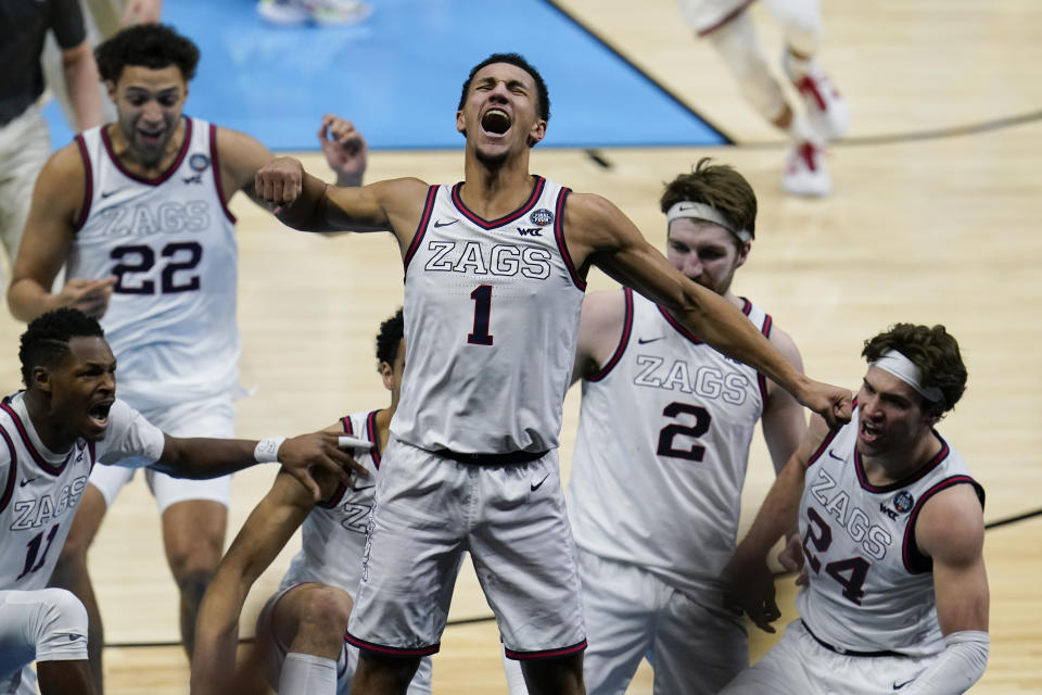 Gonzaga guard Jalen Suggs (1) celebrates making the game-winning basket against UCLA. (AP Photo/Michael Conroy)