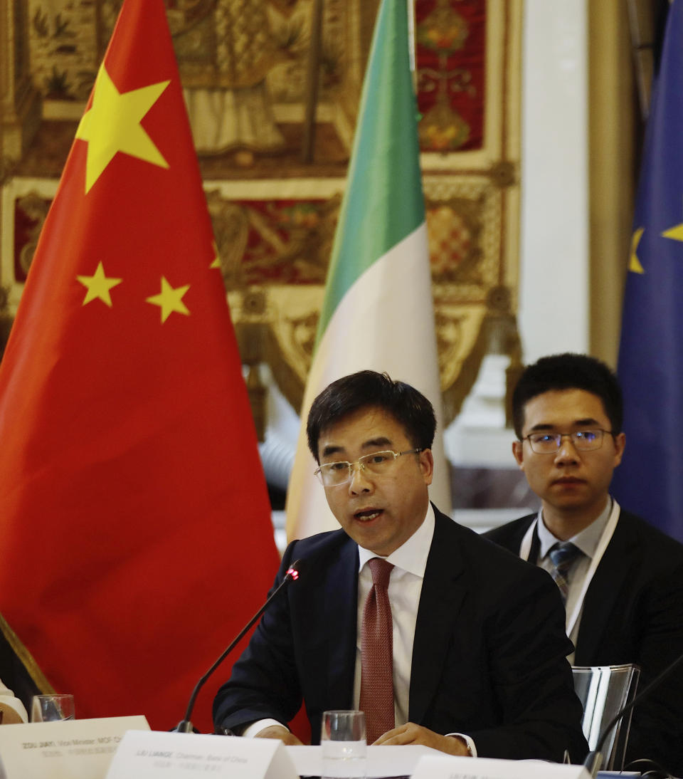 Bank of China chairman, Liu Liange, delivers his speech, on the occasion of the Italy-China Financial forum, at Palazzo Marino town hall, in Milan, Italy, Wednesday, July 10, 2019. (AP Photo/Luca Bruno)