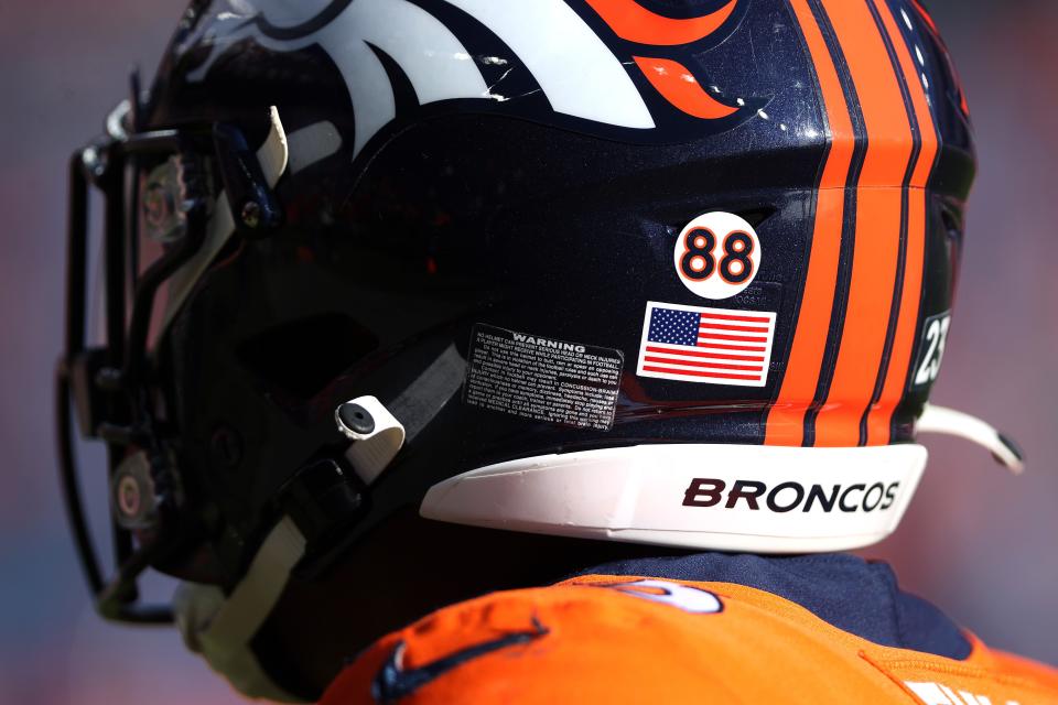 A No. 88 sticker is seen on the helmet of the Broncos' Kyle Fuller in memory of the late former Broncos WR Demaryius Thomas before the game against the Lions on Sunday, Dec. 12, 2021, in Denver.