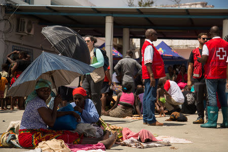 Survivors of Cyclone Idai, are seen after arriving to an evacuation centre in Beira, Mozambique, March 21, 2019. Denis Onyodi/Red Cross Red Crescent Climate Centre/Handout via REUTERS