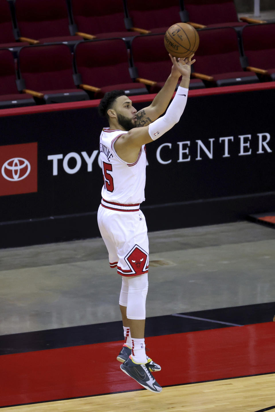 Chicago Bulls' Denzel Valentine shoots a basket against the Houston Rockets during the second quarter of an NBA basketball game Monday, Feb. 22, 2021, in Houston. (Carmen Mandato/Pool Photo via AP)