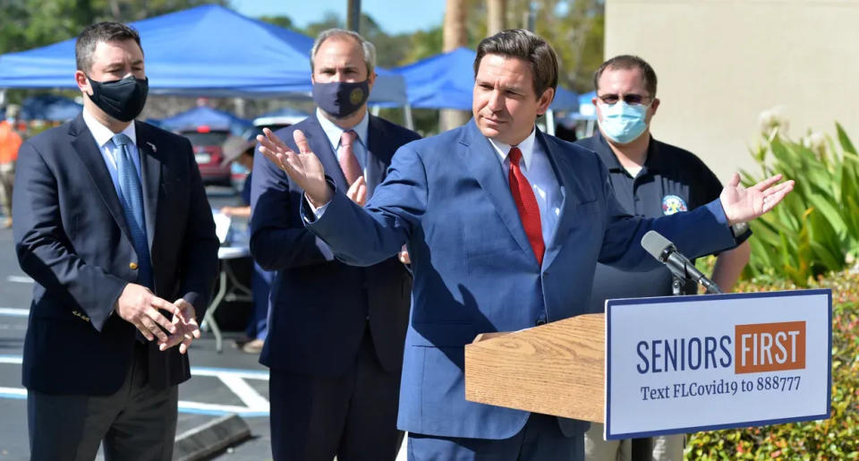 Gov. Ron DeSantis with then-Sarasota County commissioner who now faces sexual assault allegation in his role as  head of the Florida Republican Party.