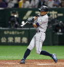 Seattle Mariners' Ichiro Suzuki fouls a ball in the fourth inning of Game 1 of a Major League opening series baseball game against the Oakland Athletics at Tokyo Dome in Tokyo, Wednesday, March 20, 2019. (AP Photo/Toru Takahashi)