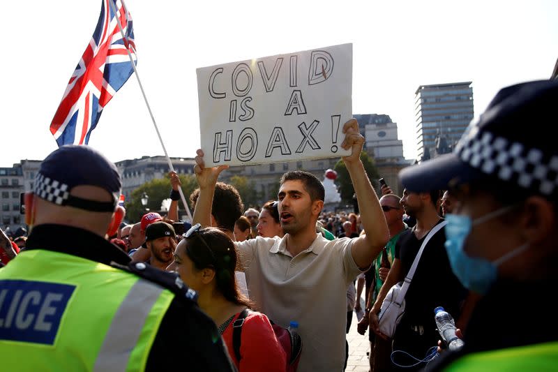 People gather in Trafalgar Square to protest against the lockdown imposed by the government, in London