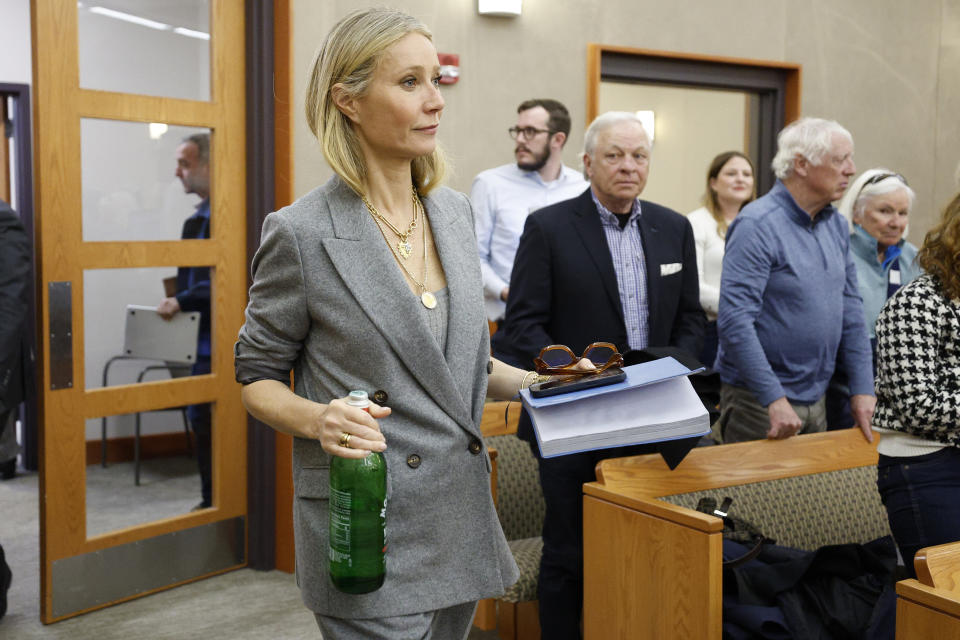 Gwyneth Paltrow enters the courtroom after a lunch break in her trial, Thursday, March 23, 2023, in Park City, Utah, where she is accused in a lawsuit of crashing into a skier during a 2016 family ski vacation, leaving him with brain damage and four broken ribs. Terry Sanderson claims that the actor-turned-lifestyle influencer was cruising down the slopes so recklessly that they violently collided, leaving him on the ground as she and her entourage continued their descent down Deer Valley Resort, a skiers-only mountain known for its groomed runs, après-ski champagne yurts and posh clientele. (AP Photo/Jeff Swinger, Pool)