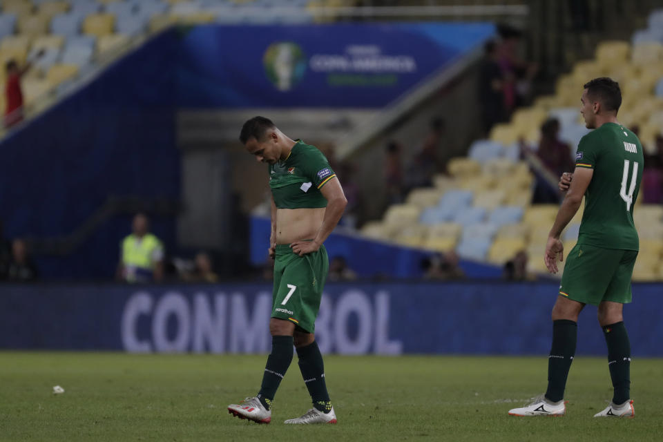 Players of Bolivia reacts after Peru scoring their 3rd goal during a Copa America Group A soccer match at the Maracana stadium in Rio de Janeiro, Brazil, Tuesday, June 18, 2019. (AP Photo/Leo Correa)