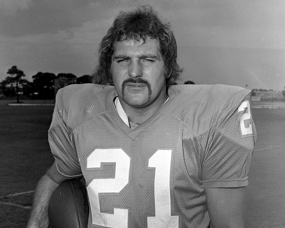 FILE - In this Aug. 9, 1972, file photo, Miami Dolphins running back Jim Kiick poses for a photo. Former running back Kiick, who helped the Dolphins achieve the NFL’s only perfect season in 1972, has died at age 73. In recent years Kiick battled memory issues and lived in an assisted living home, and the team announced his death Saturday, June 20, 2020. (AP Photo/File)