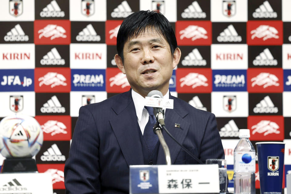 Japan’s national team coach Hajime Moriyasu speaks during a press conference in Tokyo, Wednesday Dec. 28, 2022. Moriyasu has been reappointed to the job after the Samurai Blue reached this final 16 of this year’s World Cup in Qatar, the Japan Football Association said on Wednesday.(Kyodo News via AP)