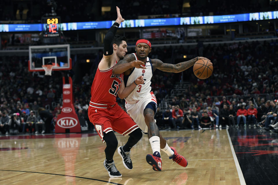 Washington Wizards' Bradley Beal (3) drives against Chicago Bulls' Ryan Arcidiacono (51) during the first half of an NBA basketball game Sunday, Feb. 23, 2020, in Chicago. Chicago won 126-117. (AP Photo/Paul Beaty)