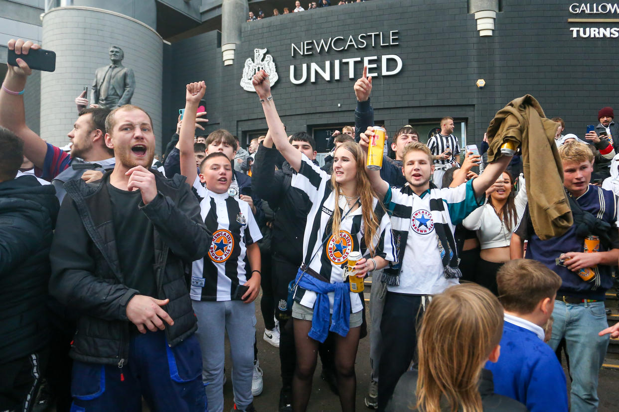 Newcastle United fans celebrate the sale of the club to the Consortium of Amanda Stavely, Jamie Rueben and PIF  Scenes at St. James's Park, Newcastle as news of a takeover emerges on Thursday 7th October 2021.  (Photo by Michael Driver/MI News/NurPhoto via Getty Images)